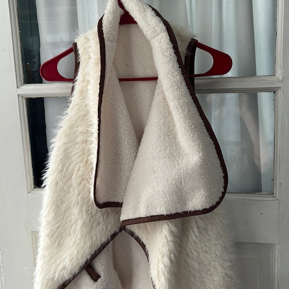 Adorable sleeveless vest from Simply Southern.